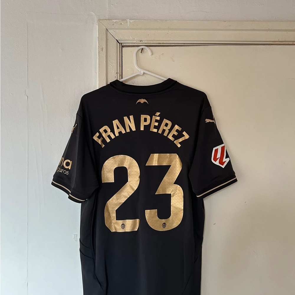 Puma Men's Black and Gold Jersey